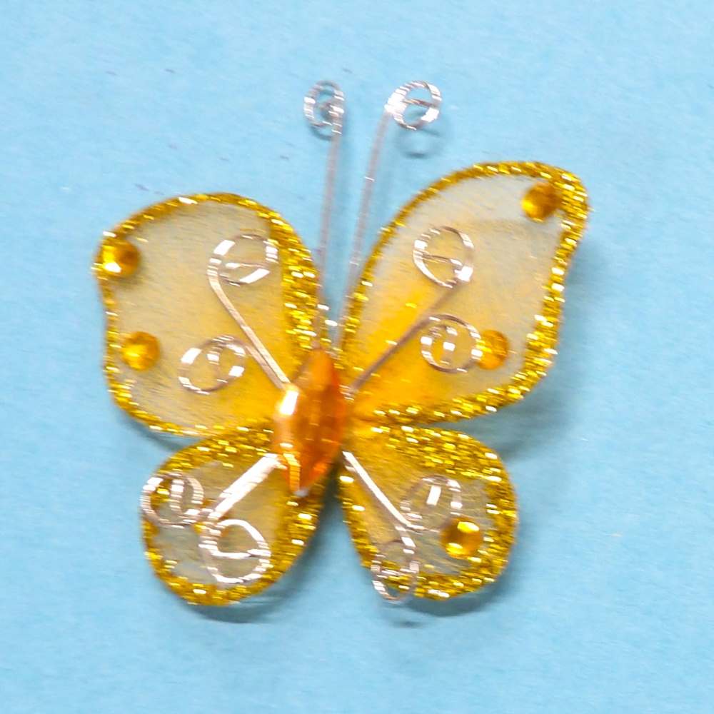 10 Light Orange Butterfly Trims With Glitter And Silver Wire Design and Light Orange Centre Stone size 55mm x 50mm Clearance