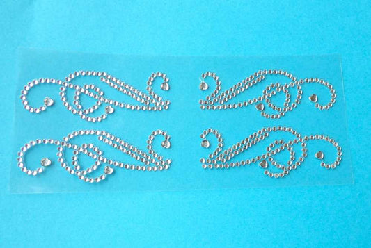 10 sheets of 4 Diamante Swirl and heart diamantes Shape Self Adhesive Sticker size 20mm x 60mm clearance