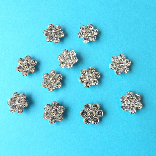 11 Small sparkly diamantes metal flat back size 14mm clearance