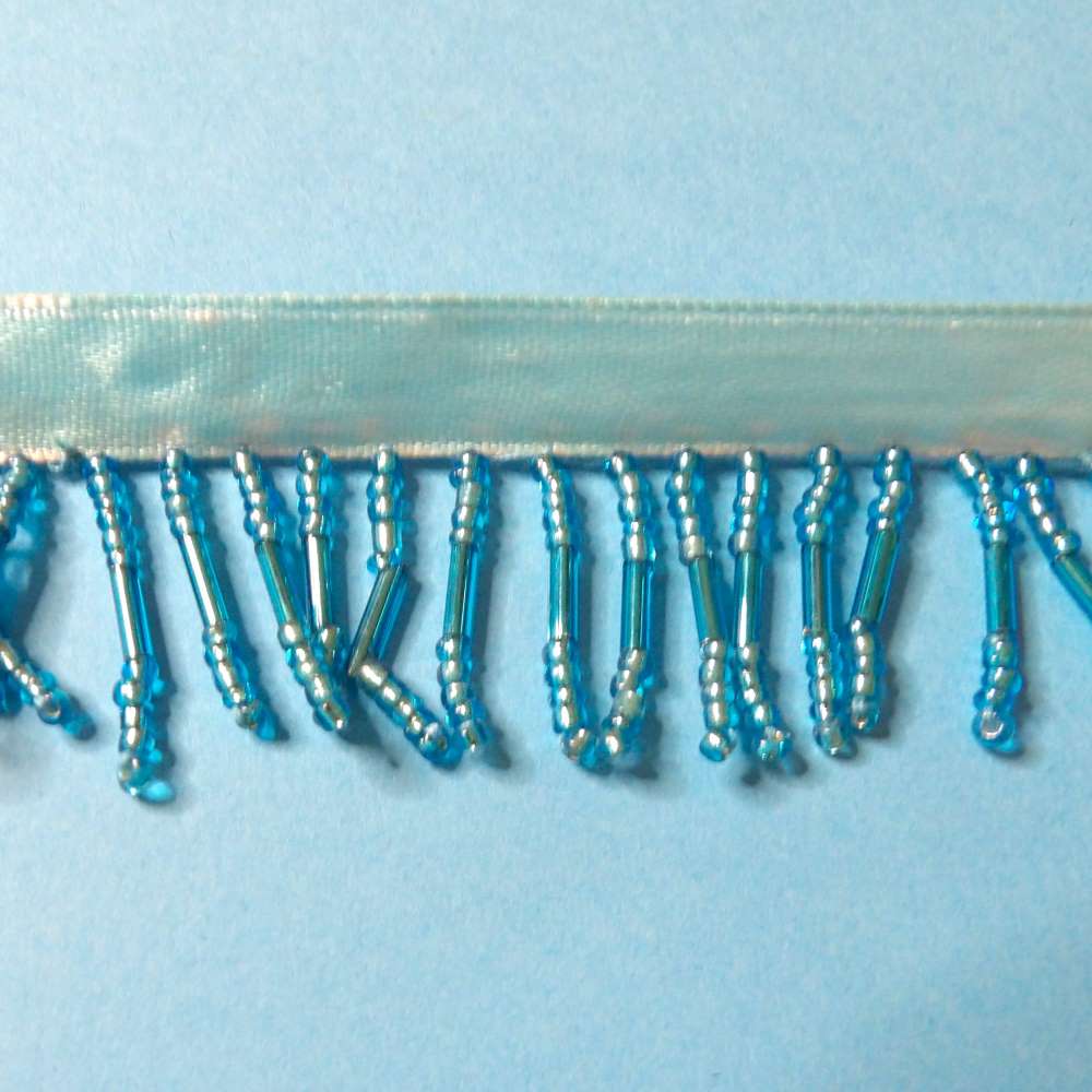 10 metres of Turquoise colour beaded fringing with 9mm ribbon 30mm wide clearance