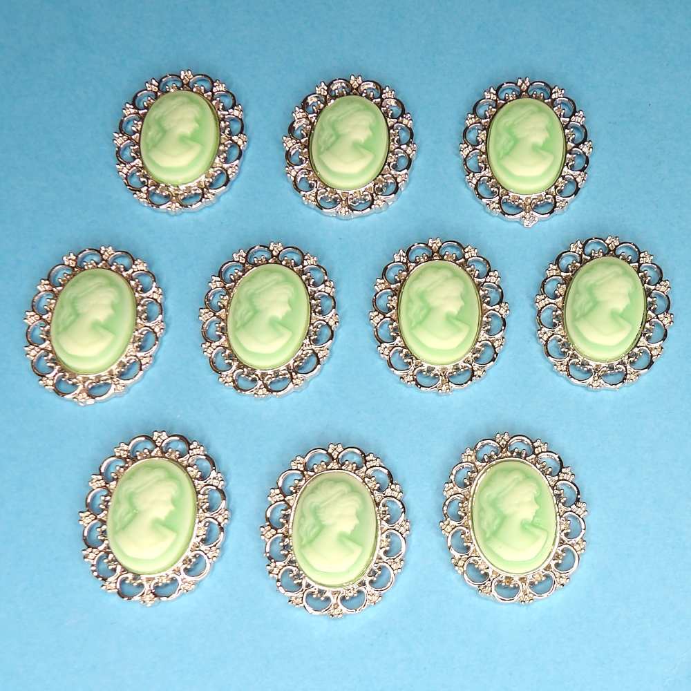 10 Mint Green Cameo with silver colour metal edge flat back size 28mm x 22mm clearance