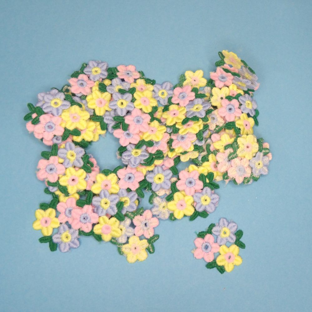 60 small flower iron on motifs lemon/pink/blue size 40mm x 40mm clearance