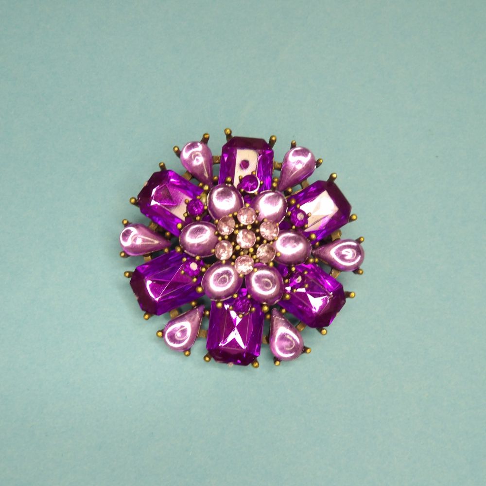 Large metal brooch with purple and lilac type stones size 53mm clearance