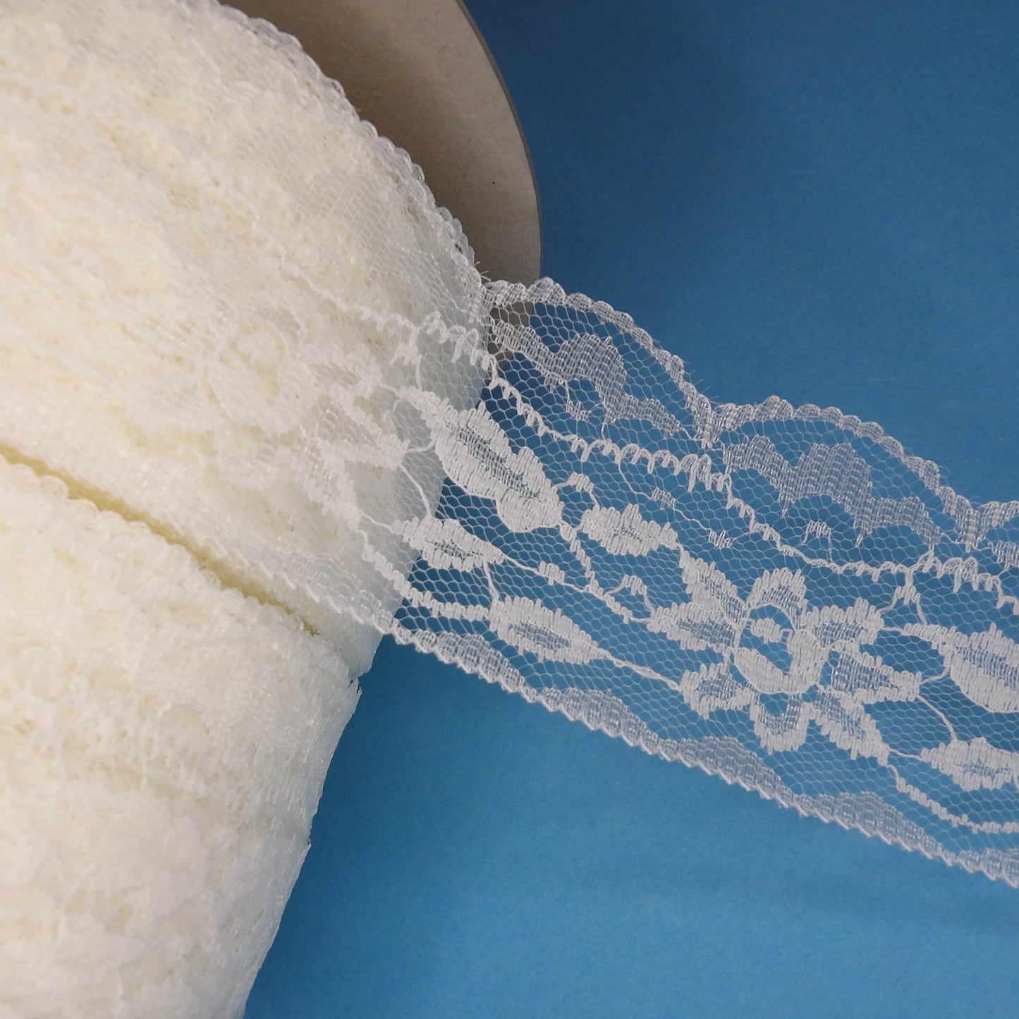 100 Metre Reel Of Floral Design Ivory Lace 55mm Wide