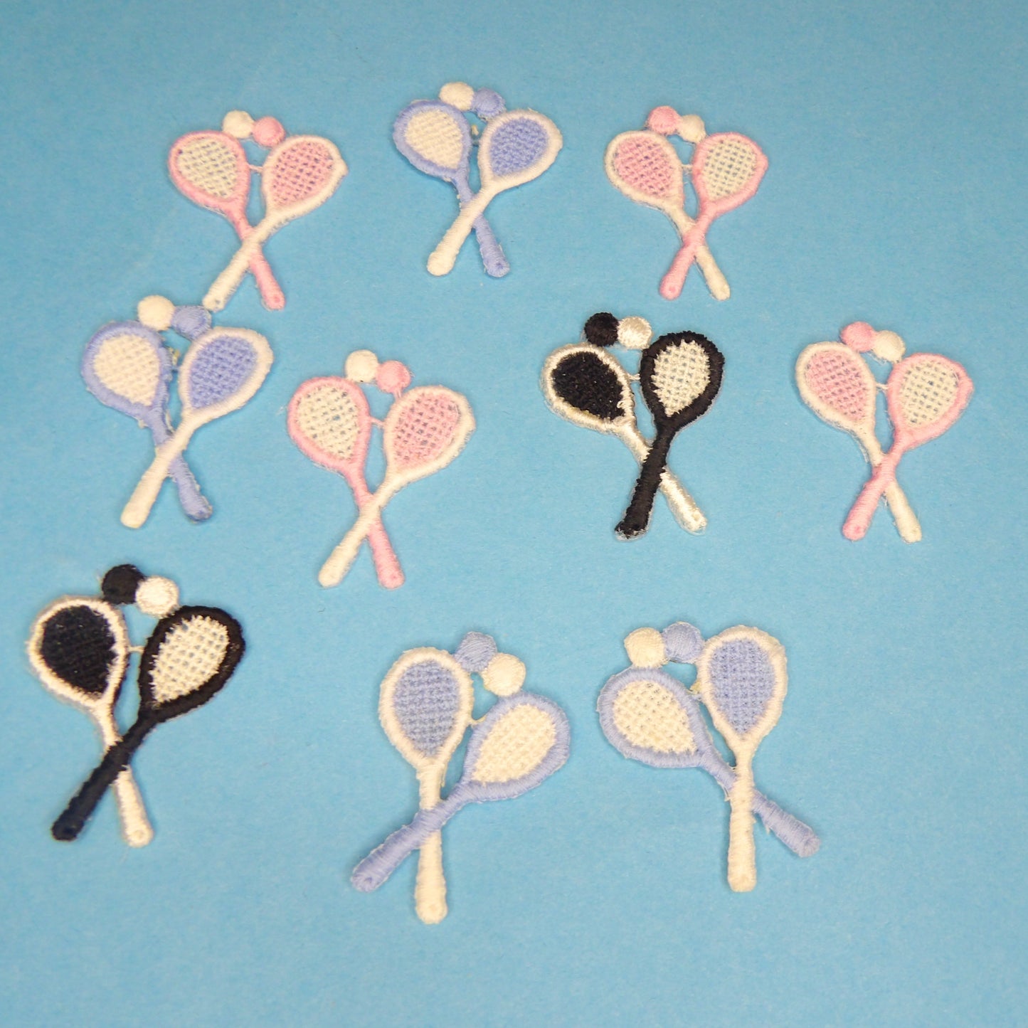 10 Small Tennis rackets and balls design small IRON ON motifs assorted light blue/ light pink/ black size 35mm x 22mm clearance