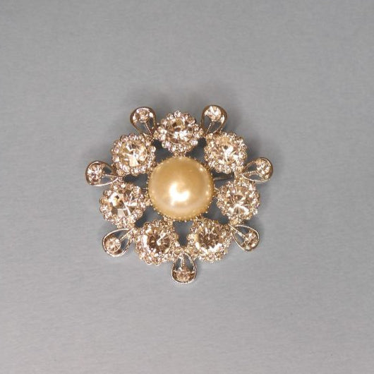 Silver colour metal brooch with 15mm pearl and clear diamantes size 46mm clearance
