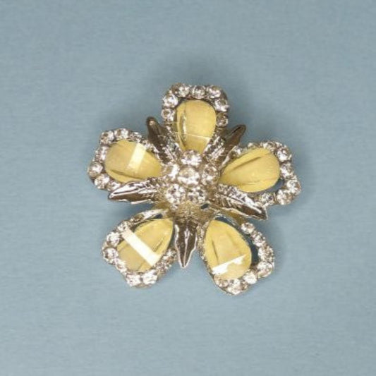 Metal brooch with diamantes and cream coloured petals size 40mm clearance
