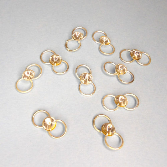 10 Silver Colour Metal Rings With A Diamante Type Stone size 22mm x 11mm clearance