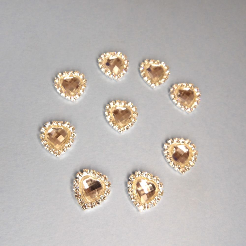 7 Heart shape with sparkly diamantes and clear stone in the centre flat back size 16mm clearance