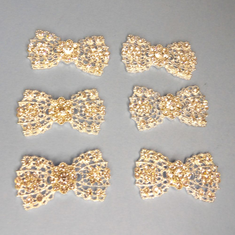 10 Light Silver colour metal Flat Back Trims BOW SHAPE with Clear diamante size 46mm x 25mm clearance