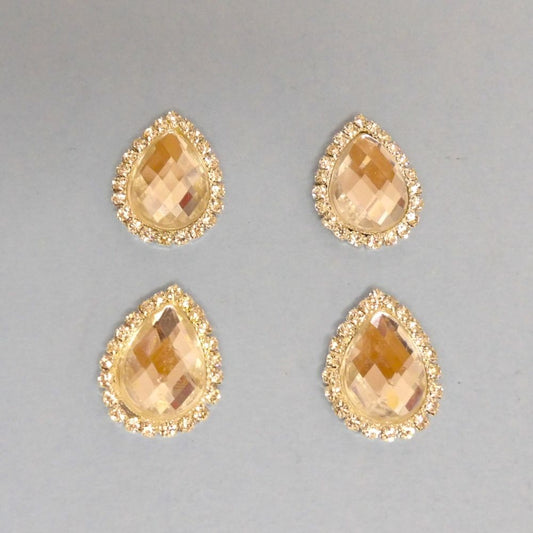 10 Tear Drop shape with sparkly diamantes and clear stone in the centre flat back size 25mm x 20mm clearance