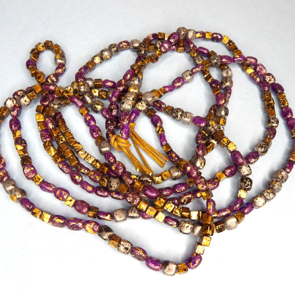 350 Approximately of Metallic Type Beads Cooper and Silver and Purple Some Square and Some Oval size 3mm to 4mm strung on a thin cord clearance