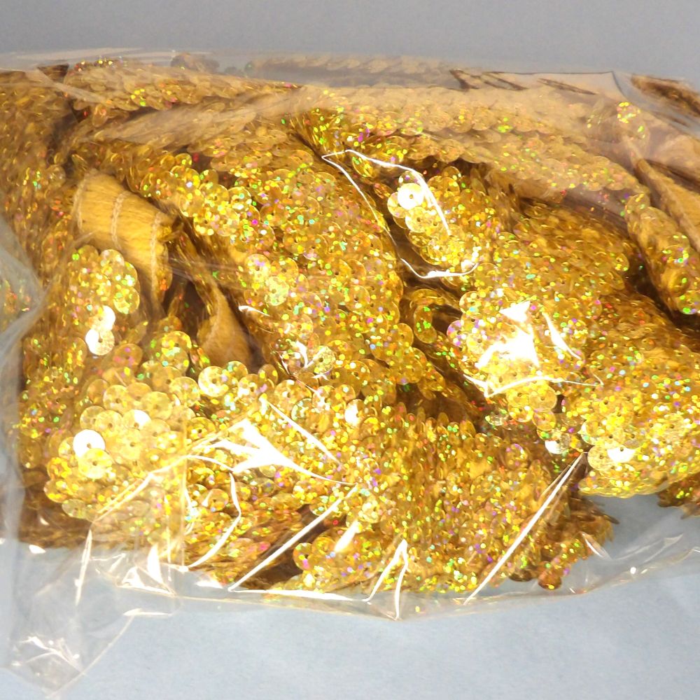 Only One Lot Of 14 metres of gold multi colour holographic 30mm sequin stretch loose in a bag