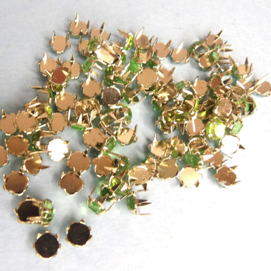 100 Light Green Crystal Diamante Rhinestone Set In Silver Colour Metal With Spikes To Bend To Fix On  Size 4mm Clearance