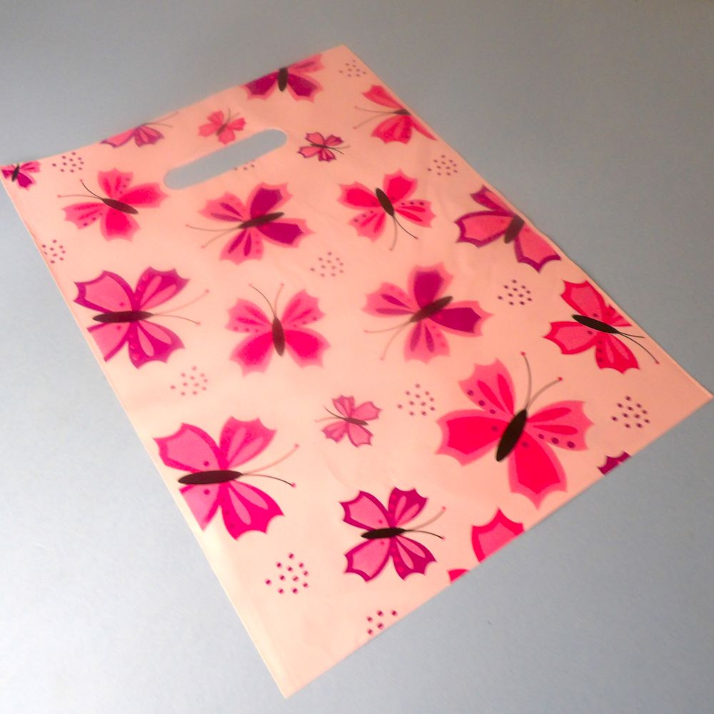 100 Small Pink Butterfly Design Party Bags / Carrier Bags Size 23cm x 30cm / 9 x 12 Inch Clearance