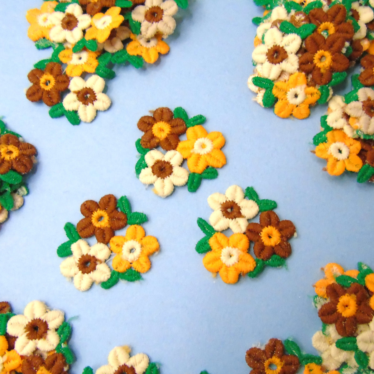 60 Brown Cream And Orange With Green Leaves Small Flower Motifs Size 40mm x 40mm Clearance