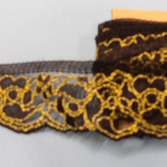 ! Only one lot of 10 metres of  black / old gold floral lace 35mm wide clearance