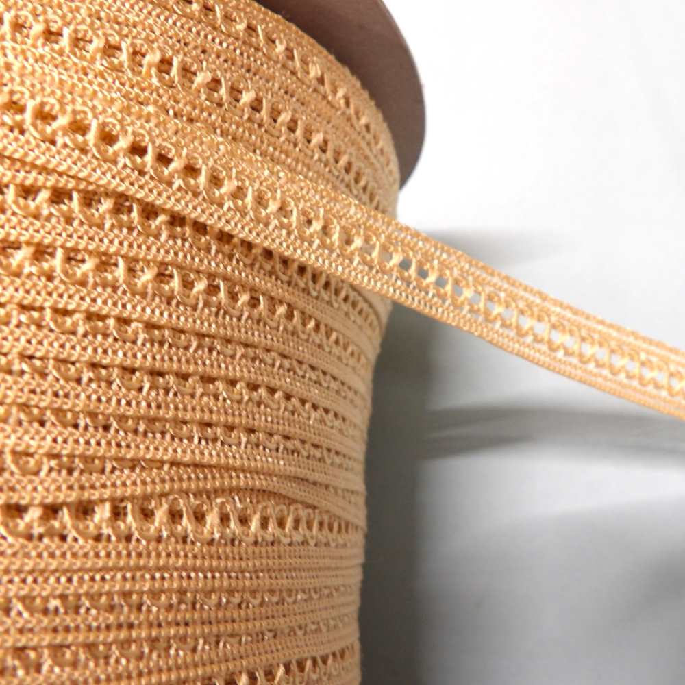 150 metre reel of light beige braid with straight edges and silky thread hole in the middle design size 10mm clearance