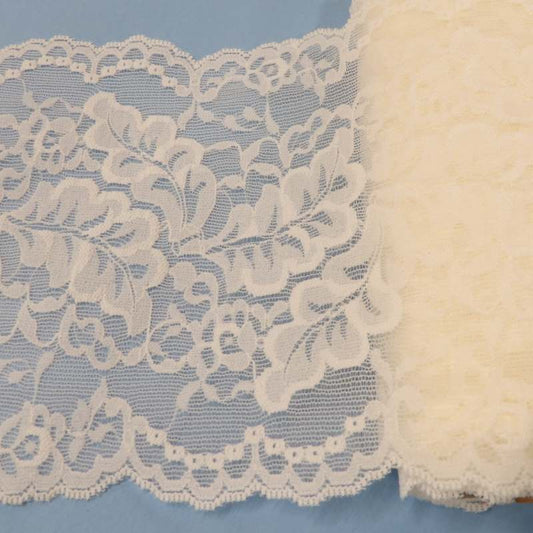 ! Only one lot of 10 metres of wide ivory stretch with leaf design lace 14cm wide clearance