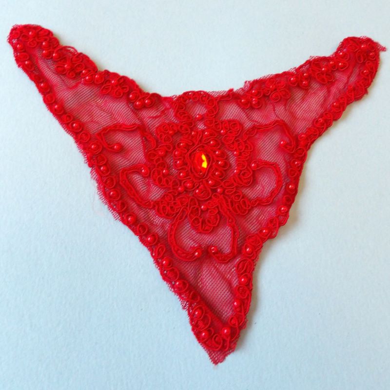 5 Red motifs with beads and a red stone in centre size 20cm x 16cm clearance
