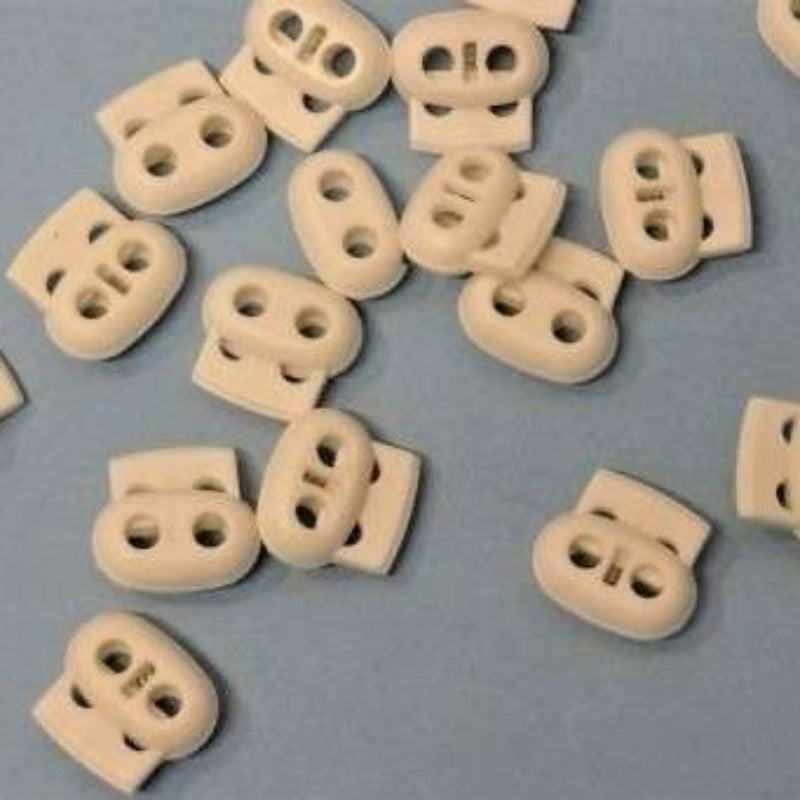 20 white spring toggles with two holes 25mm clearance