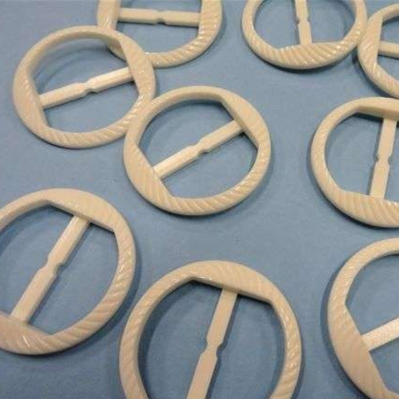 10 white round plastic buckles with patterned edge 45mm clearance