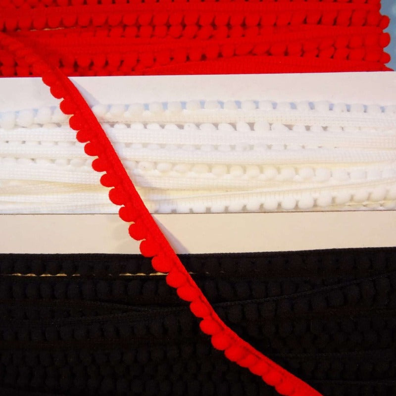 10 metres of braid with pom pom like edge 10mm wide