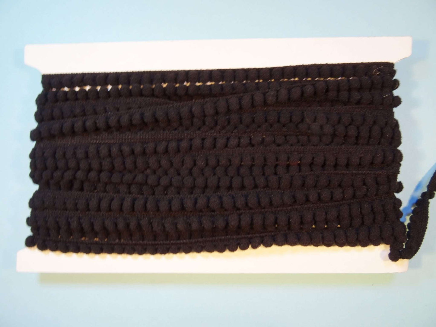 10 metres of braid with pom pom like edge 10mm wide