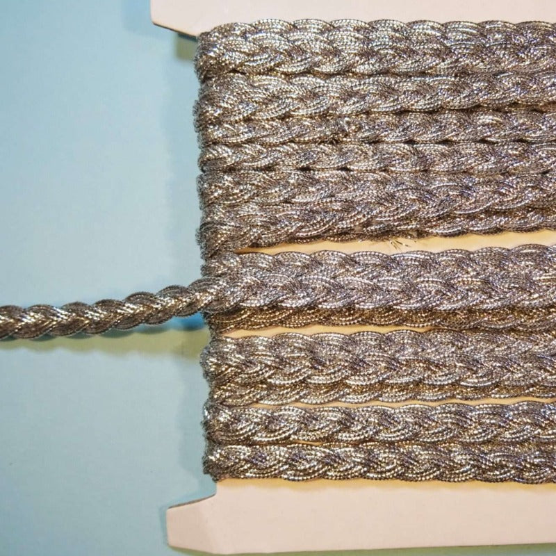 10 metres of platted Silver coloured metallic braid 8mm wide
