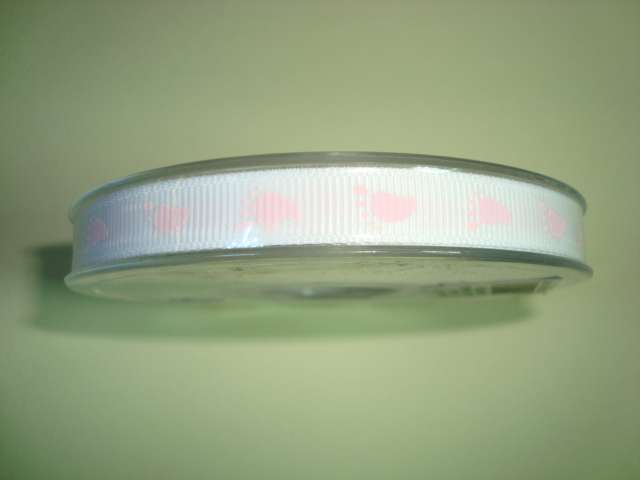 20 metre reel of ribbon with baby feet 10mm wide