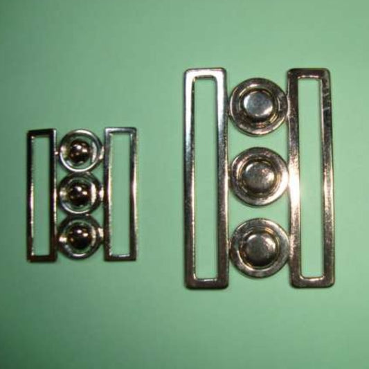 Silver coloured metal clasp buckle