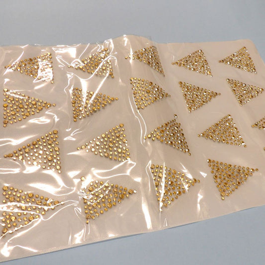 Sheet of 20 iron on triangle shape motifs made of light gold colour stones size 60mm x 55mm clearance