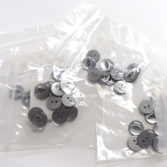 Only one lot left of 70 x bags of 10 grey fish eye buttons size 14mm 22 line