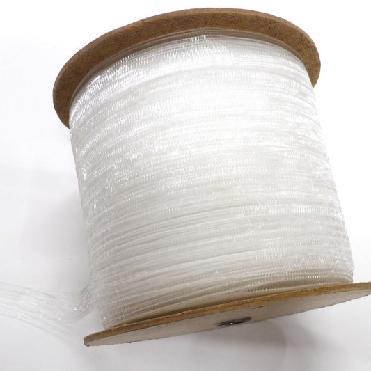 Only one reel left of approximately 180 metres of see through curtain tape 25mm wide with loop every 15mm