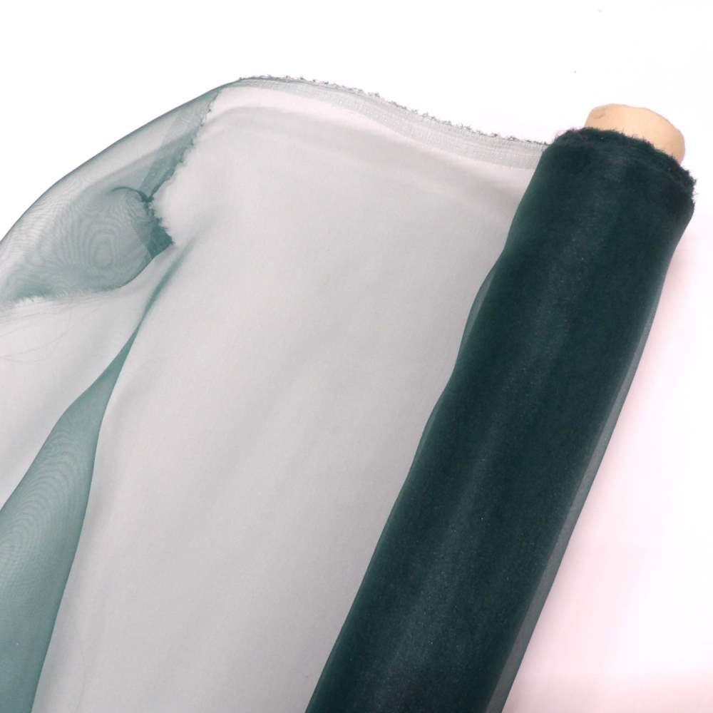 Only one left, lot a part reel of dark green chiffon type see through fabric 150cm / 60 inch wide