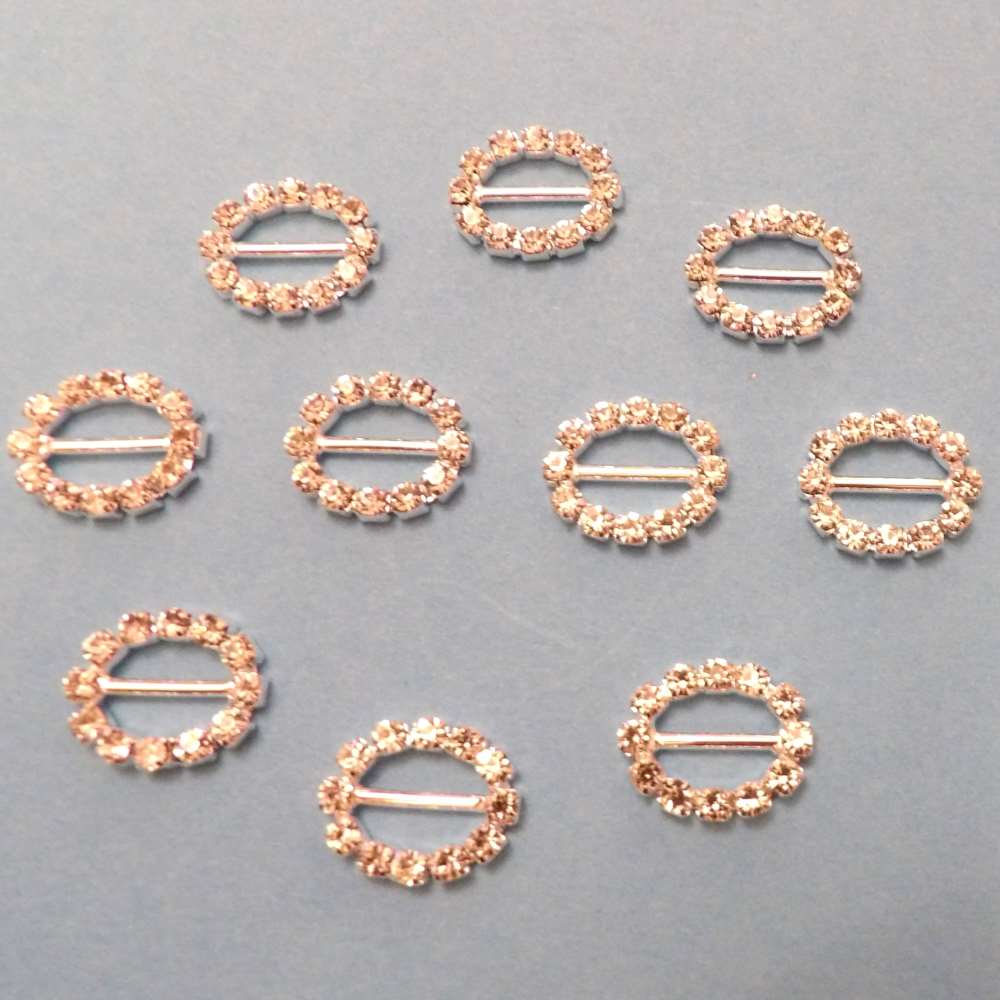 10 Small Oval Buckles with a 10mm bar Sparkly Diamantes Set In Silver Colour Metal size 18mm x 15mm clearance