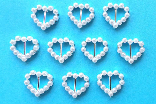 10 Small Heart Buckles with a 9mm bar White Pearl Beads Set In Silver Colour Metal size 20mm clearance