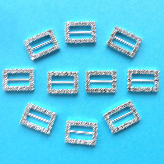 10 Small Oblong Buckles with a 15mm bar Sparkly Diamantes Set In Silver Colour Metal size 22mm x 15mm clearance