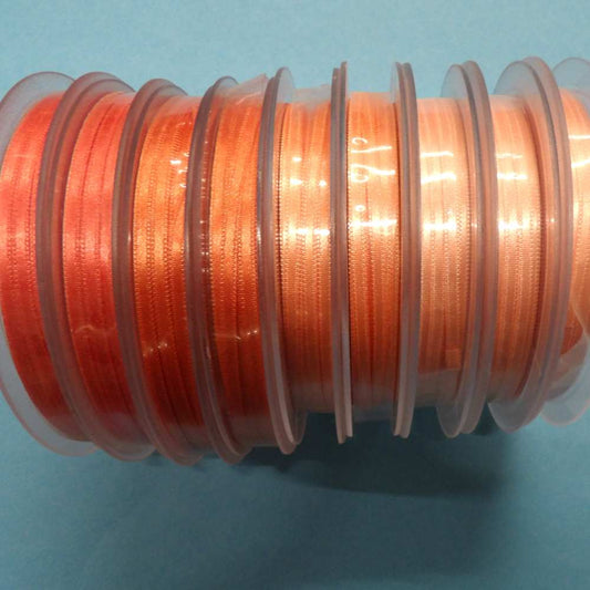 Only One lot of 9 x 50 metre reel of 3mm assorted peaches double satin ribbon clearance