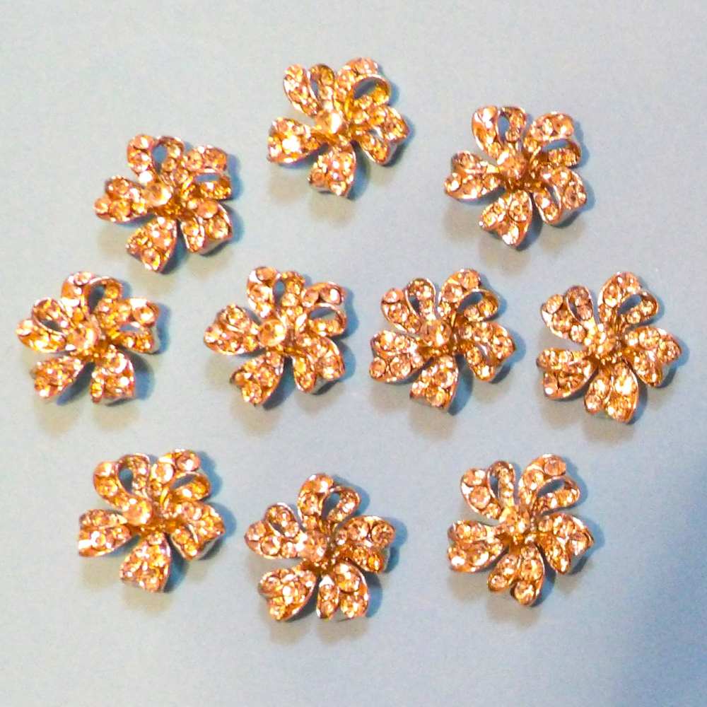 10 flower shape with sparkly diamantes flat back size 25mm clearance