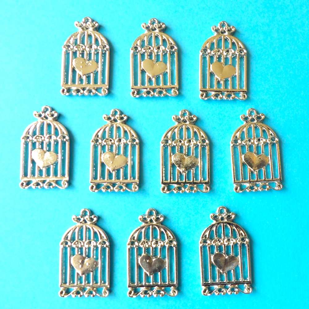 10 Silver Colour Metal Birdcage With Heart in centre size 35mm x 20mm clearance