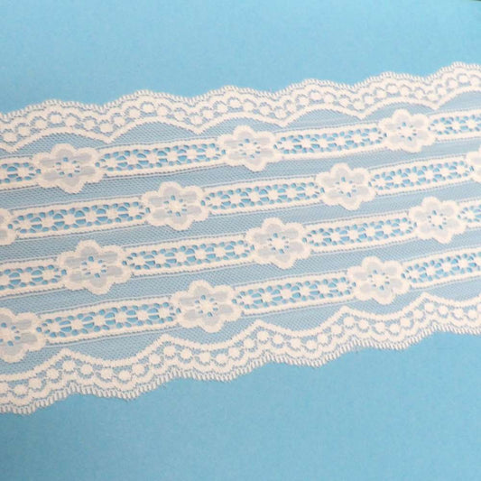 10 metres of Wide White Flower Design Double Edge Stretch Lace 15cm / 6 inch wide clearance loose in a bag