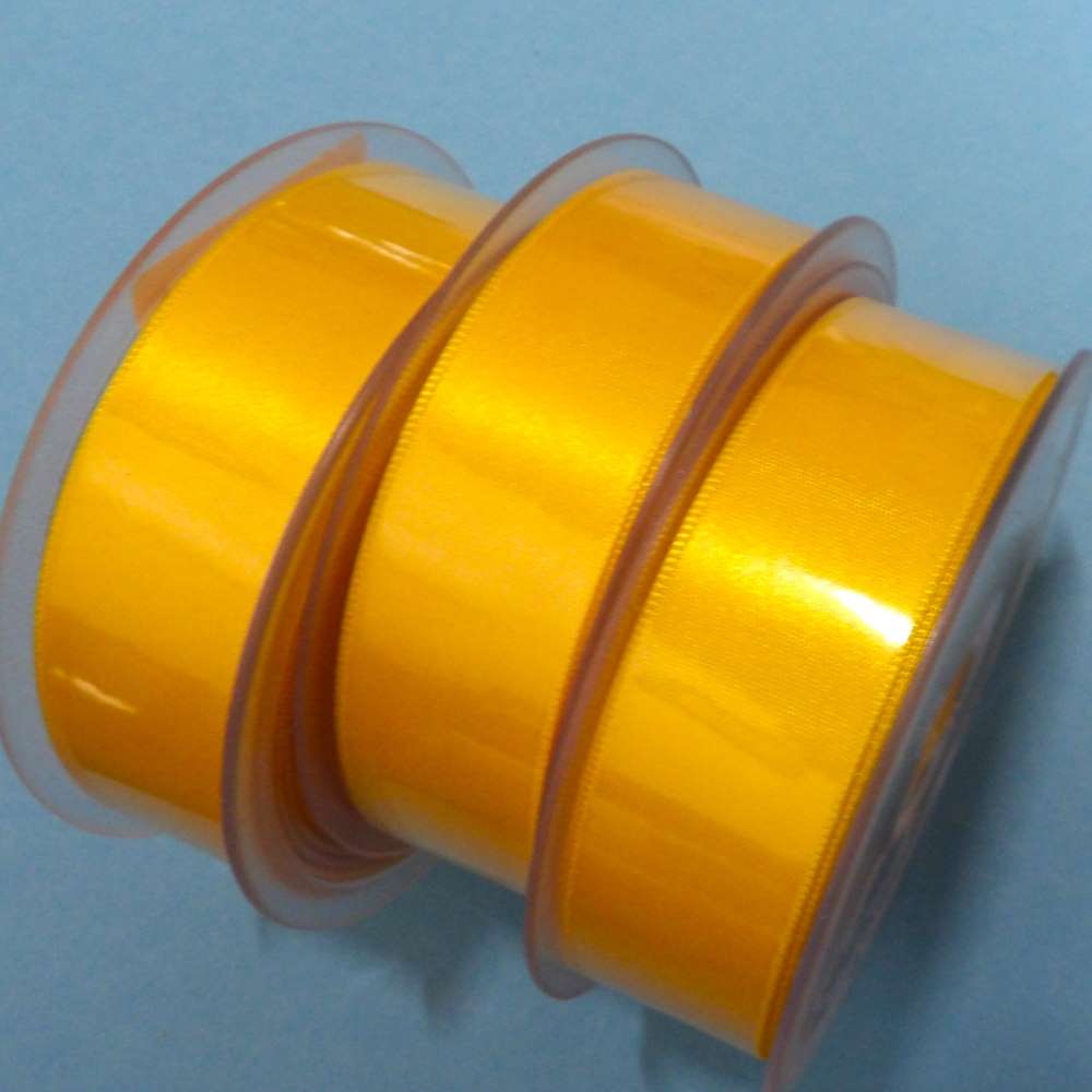 Only One lot of 3 light orange double satin ribbon 25mm wide with 25 metre on each reel