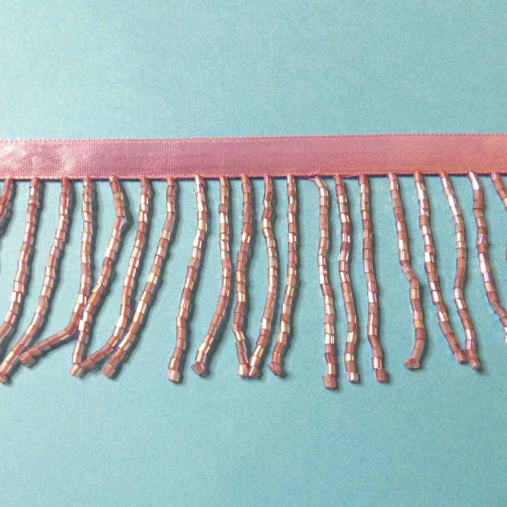 10 metres of Pale Lilac colour beaded fringing 60mm wide with 9mm ribbon clearance