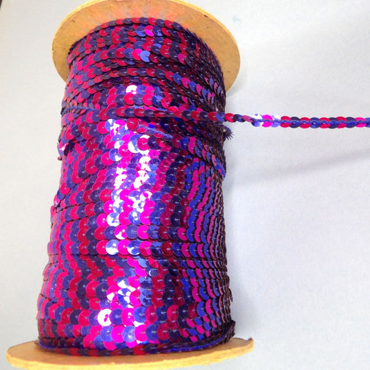 250 metre reel approximately of approximately of 6mm  strung sequins two tone Cerise / Royal Blue clearance