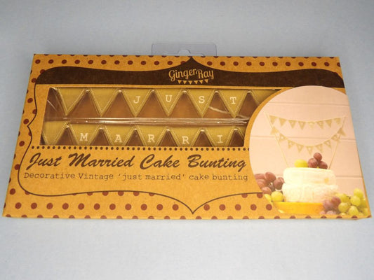 Miniature bunting cake topper from Ginger Ray, with tiny cotton brown triangle flags printed with letters spelling out Just Married brown box clearance