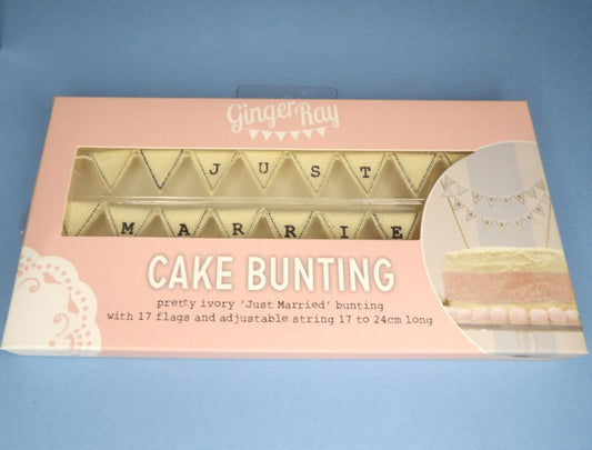 Miniature bunting cake topper from Ginger Ray, with tiny cotton cream triangle flags printed with letters spelling out Just Married pink box clearance