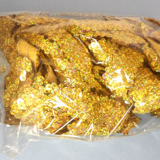 Only One Lot Of 14 metres of gold multi colour holographic 30mm sequin stretch loose in a bag