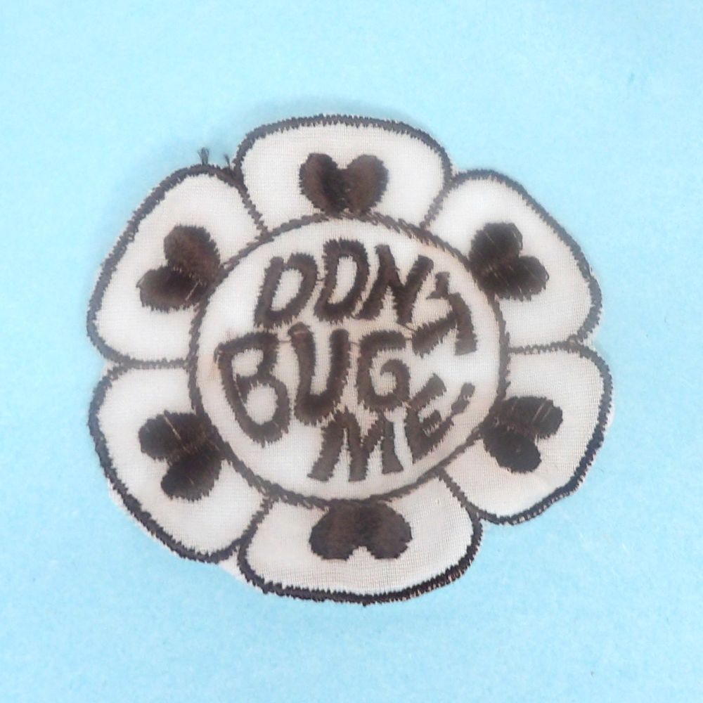 60 Flower Shape Black Embroidered See Through Motifs With Don't Bug Me Design Size 70mm Clearance