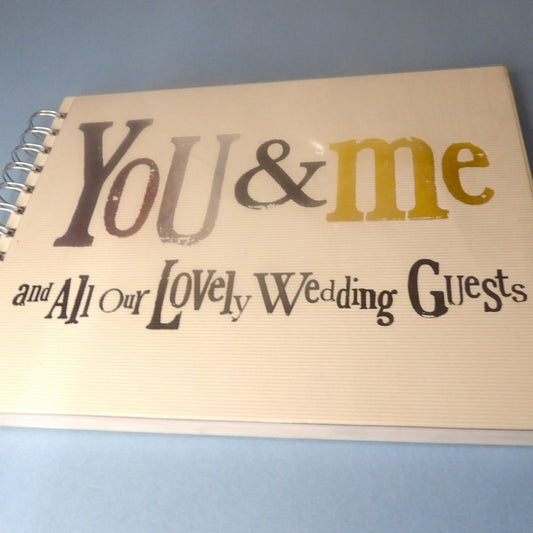 Only One Lot Of 1 Oblong Wedding Book With Metal Ring Binding And White Pages With ' You And Me And All Our Lovely Wedding Guests ' On The Cover Size 23cm x 17cm